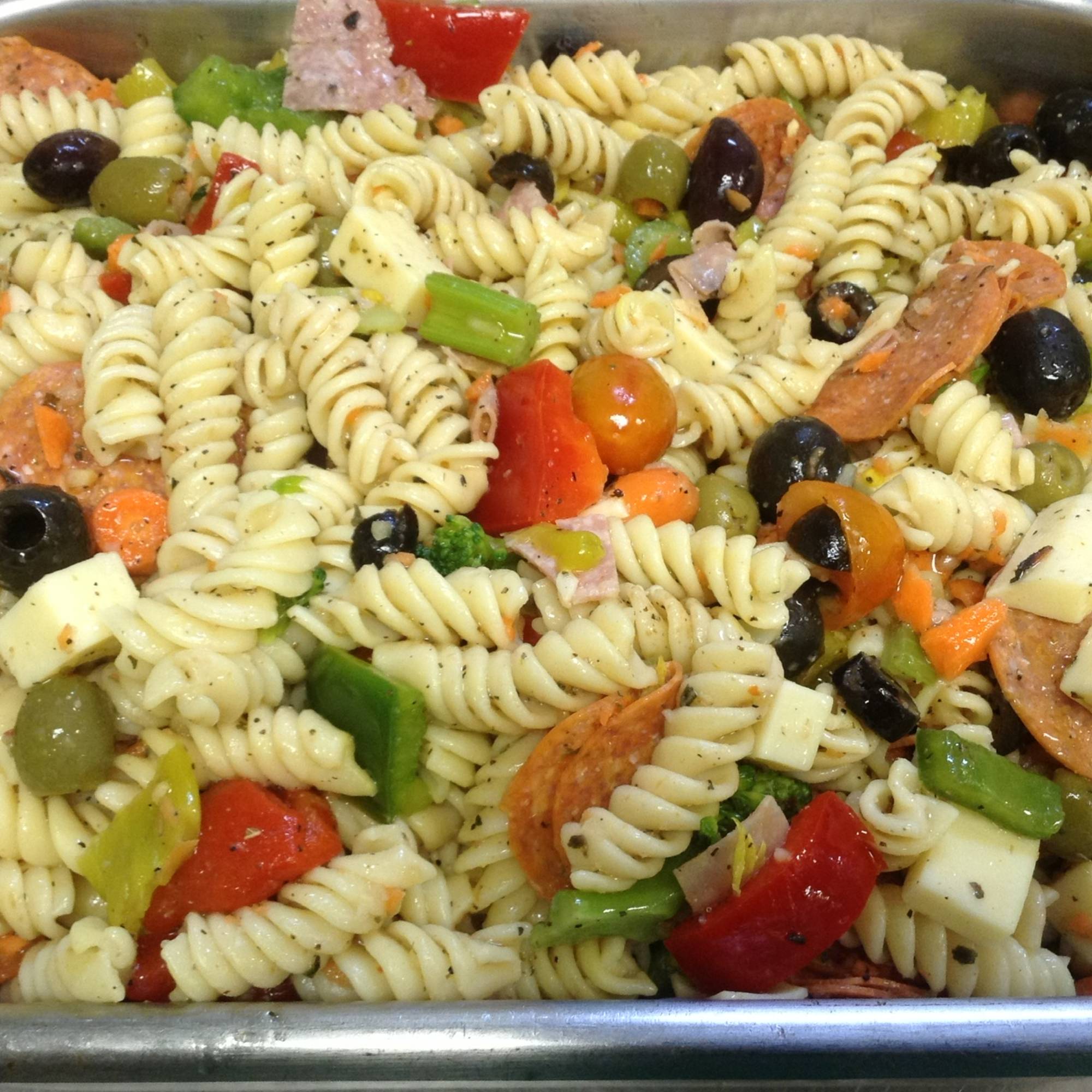 A close up of pasta salad in a pan