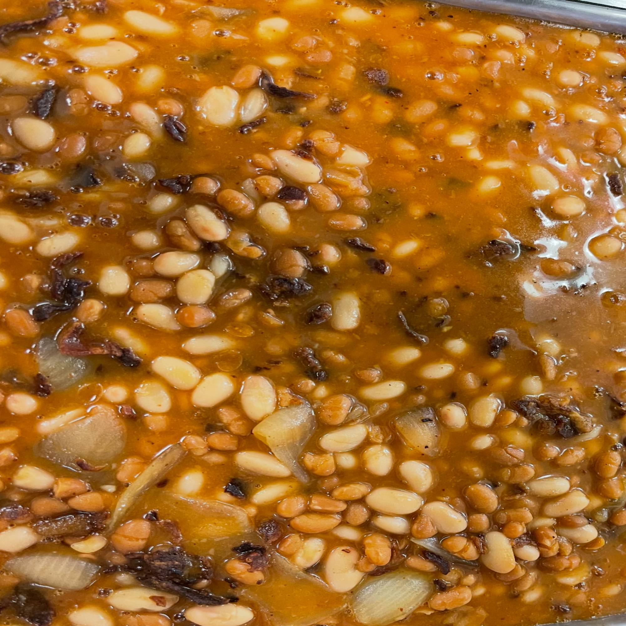A close up of beans in sauce