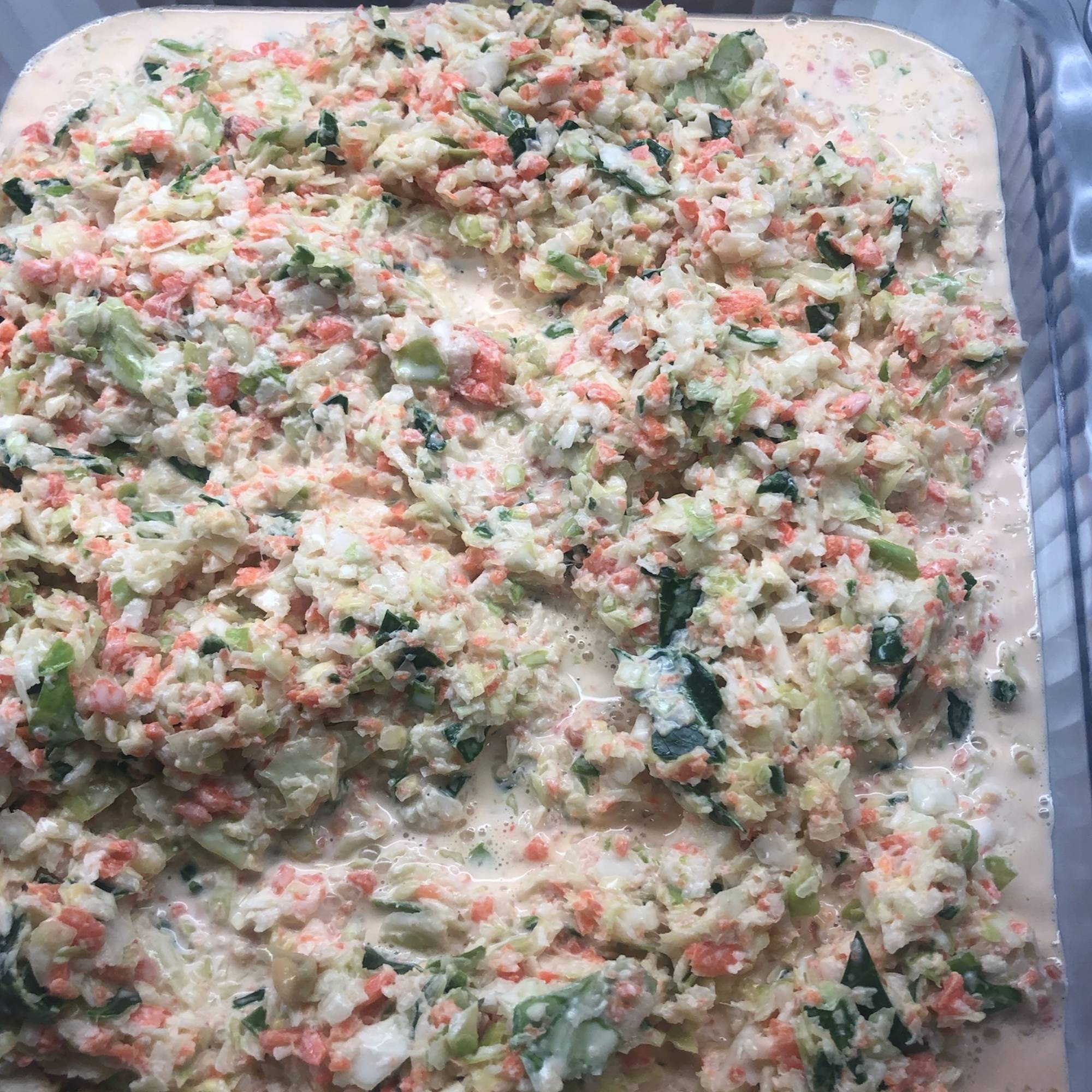 A tray of food that is on the table.
