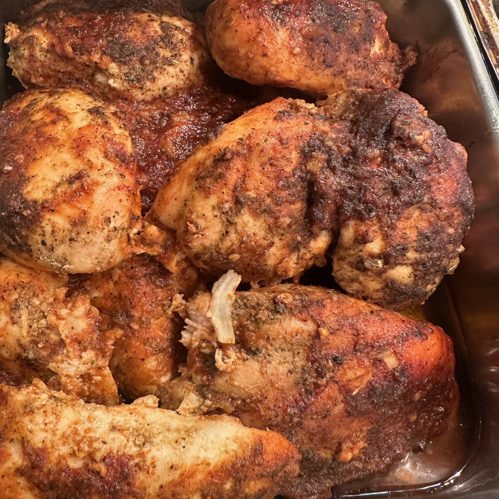 A close up of some meat in a pan